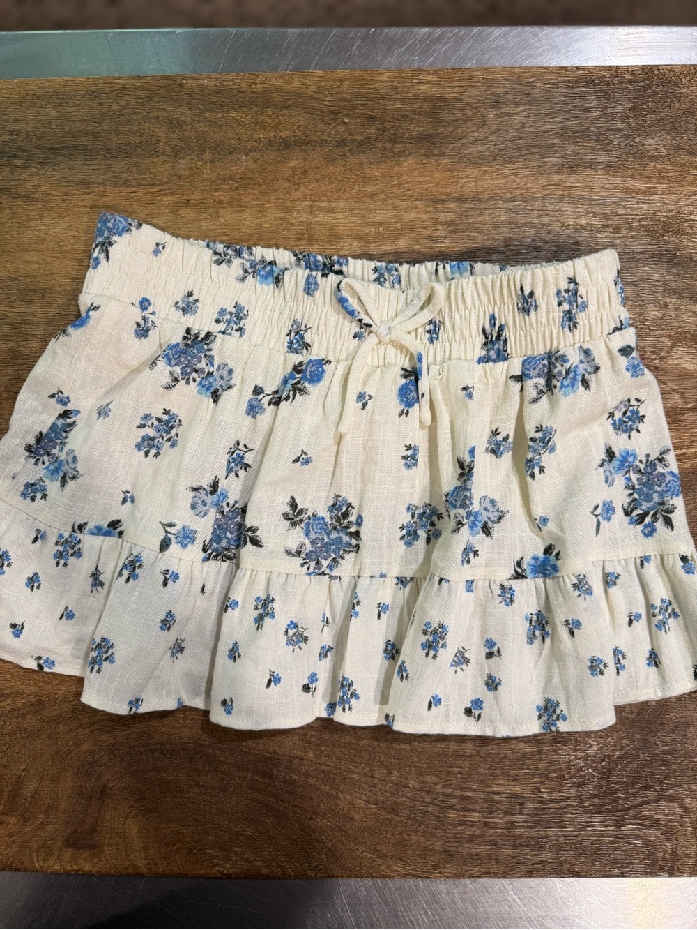 Eyeshadow Cream Skirt with Blue Floral Print and Ruffle Hem